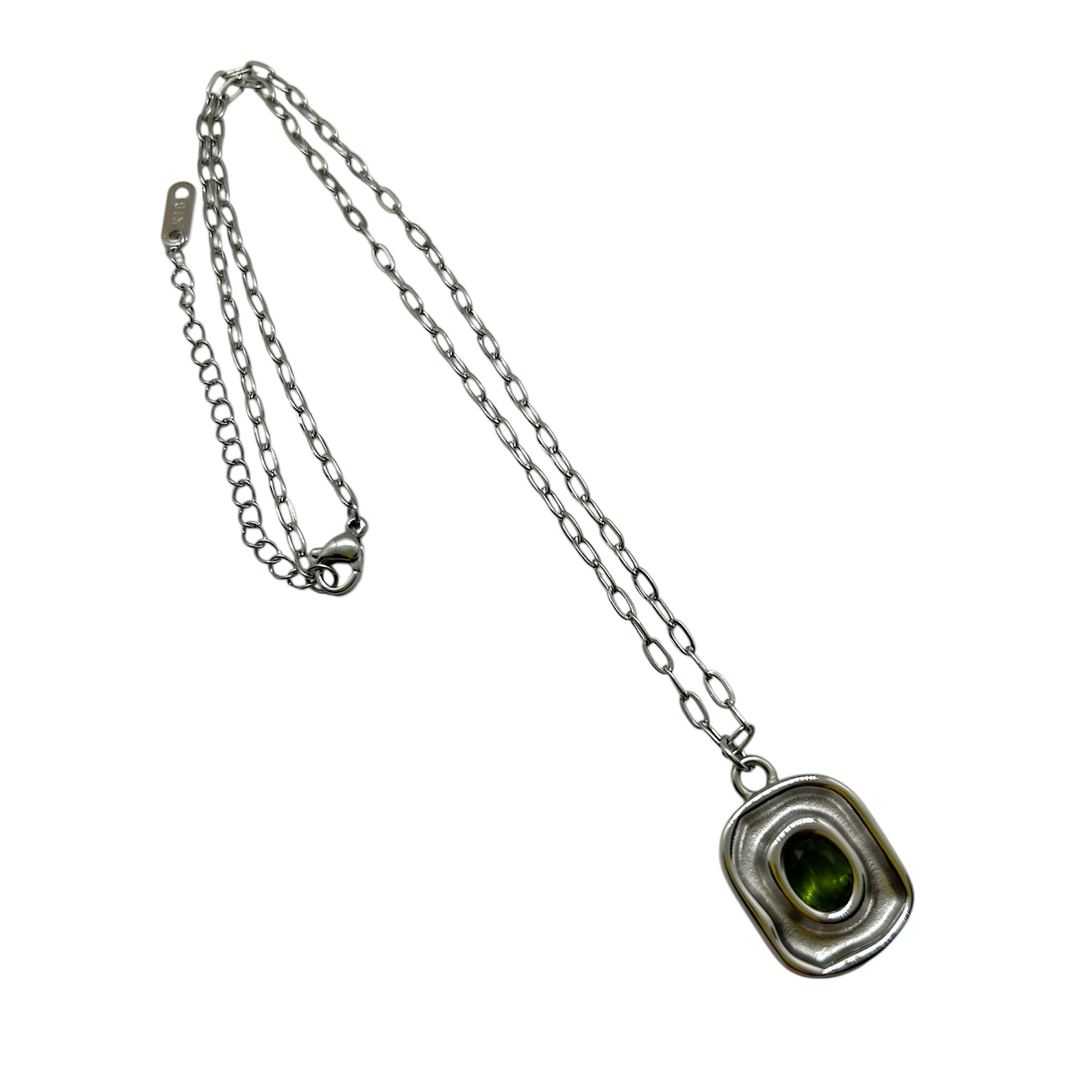 Silver steel necklace with green zirgon.